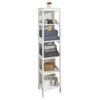 A white, multi-shelf storage unit filled with folded towels, a basket, and some boxes. Náhled obrázku produktu