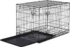 A black metal dog crate with its tray pulled out. Podgląd zdjęcia produktu