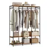 A freestanding wardrobe rack with clothes hanging on it and various storage boxes and shoes on the shelves. Náhled obrázku produktu