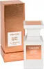 A bottle of Tom Ford Soleil De Feu Eau de Parfum and its packaging are displayed against a white background. Voir les images du produit