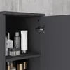 A close-up view of an open gray bathroom cabinet with various toiletries on shelves. Produktbild-Vorschau