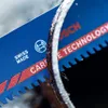 A close-up view of a Bosch saw blade, showing its teeth and branding. Voir les images du produit