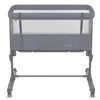 A grey baby crib with mesh sides and a white mattress, shown from the front on a white background. Anteprima dell’immagine prodotto
