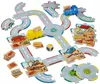 A children's board game featuring construction site elements, roads, trucks, and building pieces. Produktbild-Vorschau