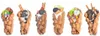 Six bubble waffles filled with ice cream and toppings, arranged in a row against a white background. Podgląd zdjęcia produktu