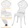 A white metal bistro chair with an ornate floral design, shown with close-up details of its backrest, seat, and adjustable feet. Produktbild-Vorschau