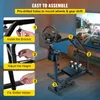 A gaming setup with a racing wheel stand and a screen showing a racing game. Produktbild-Vorschau
