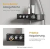 A close-up view of a modern shower system's control panel and shelf, with product bottles on the shelf. Anteprima dell’immagine prodotto