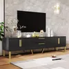 A modern living room setting with a black TV stand and a large television. Produktbild-Vorschau