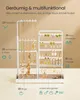 A white jewelry organizer stand with various jewelry items displayed on it, with text overlays describing its capacity and features. Produktbild-Vorschau
