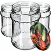 Three empty glass jars are arranged in a group, with a close-up of tomatoes and cucumbers in plastic wrap partially obscuring one of the jars. Náhled obrázku produktu