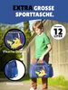 A young boy is holding a blue sports bag with a Pikachu design on it, outdoors. Produktbild-Vorschau