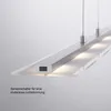 Close-up of a modern LED pendant lamp with a silver metal frame and a frosted glass diffuser, showing a sensor switch. Produktbild-Vorschau