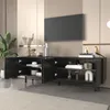 A modern living room scene featuring a black TV stand with open doors, displaying decorative items and books, with a large television mounted on the wall above it. Produktbild-Vorschau