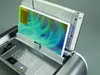 A close-up shot of a Fellowes Helios 30 thermobinding machine with a document inserted. Anteprima dell’immagine prodotto