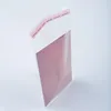 A clear, professional studio shot of a pink envelope inside a clear plastic bag. Náhľad obrázku produktu