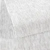 A close-up view of a textured rug. Produktbild-Vorschau