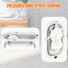 A collage showing a foldable baby bathtub in use and folded, with a bathroom counter in the background. Produktbild-Vorschau
