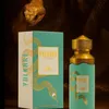 A perfume bottle and its box are displayed with a snake's head above them. Náhľad obrázku produktu