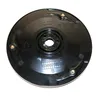 The underside of a black circular lawnmower blade disc with gold mounting points and embossed text and symbols. Produktbild-Vorschau