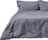 A close-up view of a gray linen duvet cover and pillowcase set on a bed.