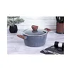 A granite-effect pot with a glass lid and wooden handles is displayed on a wooden table, with a small potted plant and kitchen utensils in the background. Náhľad obrázku produktu