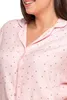 Close-up of a person wearing a pink polka dot pajama top. Produktbild-Vorschau