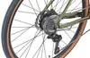 A close-up view of the rear wheel and drivetrain of a green bicycle. Produktbild-Vorschau
