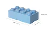 A light blue LEGO-style storage box with dimensions indicated. Produktbild-Vorschau
