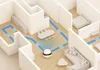 A robotic vacuum cleaner is shown navigating a floor plan of a house, with blue arrows indicating its path. Anteprima dell’immagine prodotto