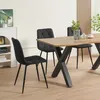A dining room scene with a table and chairs. Náhled obrázku produktu