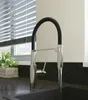 A modern kitchen sink with a faucet running water. Náhled obrázku produktu