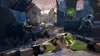 A first-person perspective of a player holding a device during a combat scenario with alien creatures. Produktbild-Vorschau