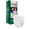 A package of Bambo Dreamy Night Pants for boys is shown next to a single diaper. Podgląd zdjęcia produktu