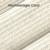 A close-up of a textured fabric with diagonal lines and text overlay. Produktbild-Vorschau