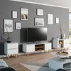 A living room scene featuring a TV, entertainment center, and side tables. Náhľad obrázku produktu