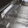 A close-up view of the interior of a stainless steel grill, focusing on the grates and a rotisserie spit. Anteprima dell’immagine prodotto