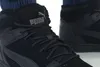 Close-up view of a black Puma sneaker. Produktbild-Vorschau