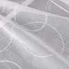 A close-up view of white fabric with a subtle text and circular pattern. Produktbild-Vorschau