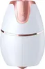 A white and rose gold hair dryer. Náhled obrázku produktu