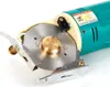 Close-up of an electric rotary cutter with a circular blade. Produktbild-Vorschau
