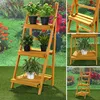 A collage of images showing a wooden plant stand with plants on it, set in a garden. Produktbild-Vorschau