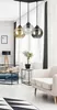 A modern living room with a pendant light fixture. Produktbild-Vorschau