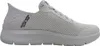 A side view of a white Skechers slip-on sneaker against a white background. Voir les images du produit