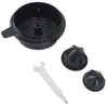 A set of black and white plastic parts for a juicer, laid out on a white background. Produktbild-Vorschau