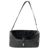 A black pet car seat with a strap is shown against a white background. Anteprima dell’immagine prodotto