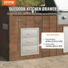 An outdoor kitchen setup with brick walls and stainless steel drawers. Náhled obrázku produktu