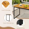 A wooden table with black metal legs is shown on a tiled patio, with close-up insets highlighting product features. Produktbild-Vorschau