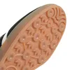 A close-up view of the sole of a black Adidas sneaker with white stripes. Produktbild-Vorschau