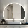 A bathroom vanity with a sink and a large illuminated mirror. Produktbild-Vorschau